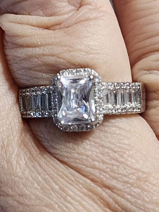 Jewelry - Silvertone Crystal Halo Engagement Ring with Channel Set Crystals